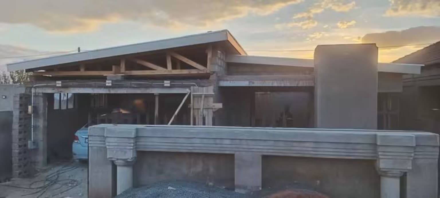 Construction project progress at sunset
